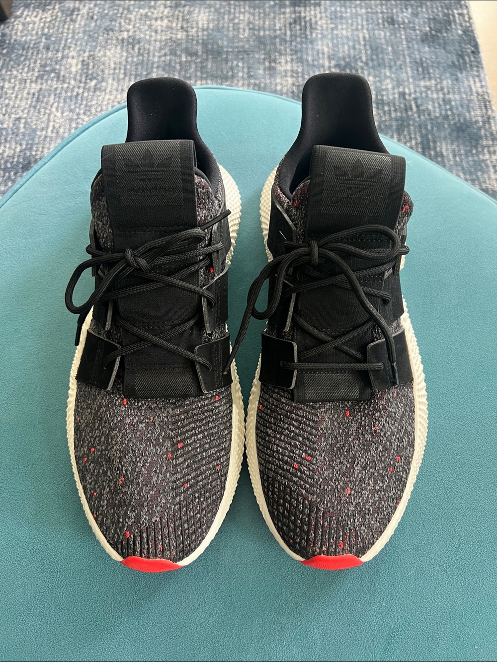Adidas Men's Black Knit Sneakers with Red Accents